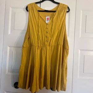 NWT Torrid Mustard colored sleeveless tunic blouse